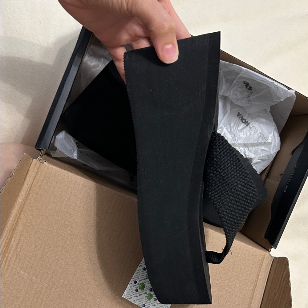 Black platform thong flip flop sandals